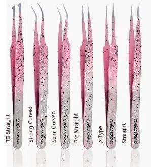 A pink and white set of tweezers with different colors.