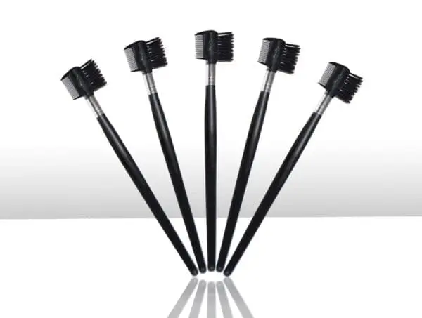 A group of black toothbrushes on top of each other.