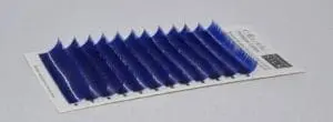 A close up of blue colored individual lashes