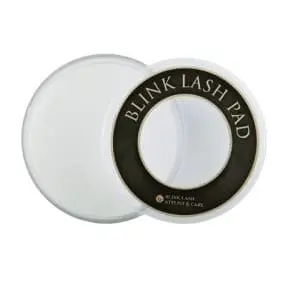 A white and black blink lash pad next to each other.