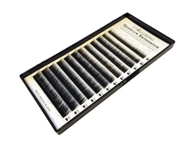 A tray of individual lashes in black and white.