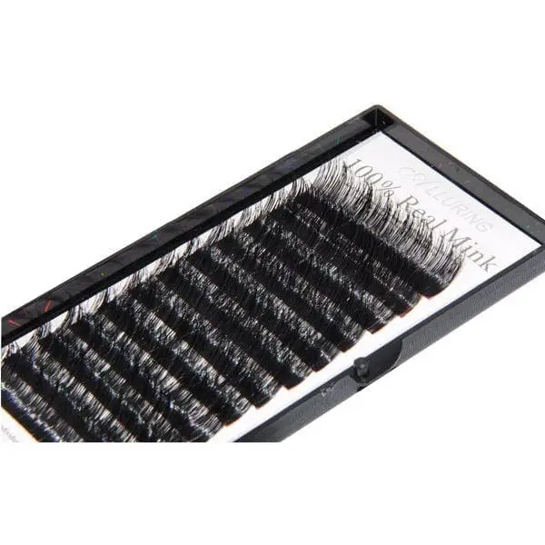 A close up of a box filled with individual lashes