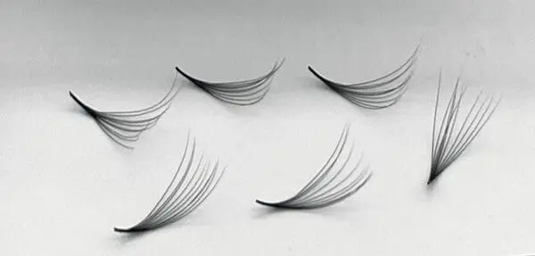A group of four pairs of false eyelashes.
