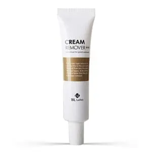 A white tube of cream sitting on top of a table.