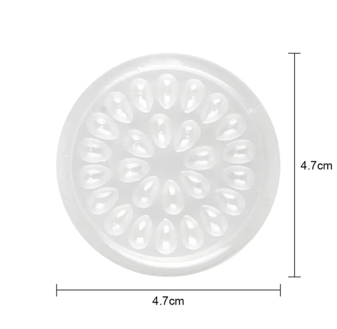 A white plastic plate with a pattern of flowers.