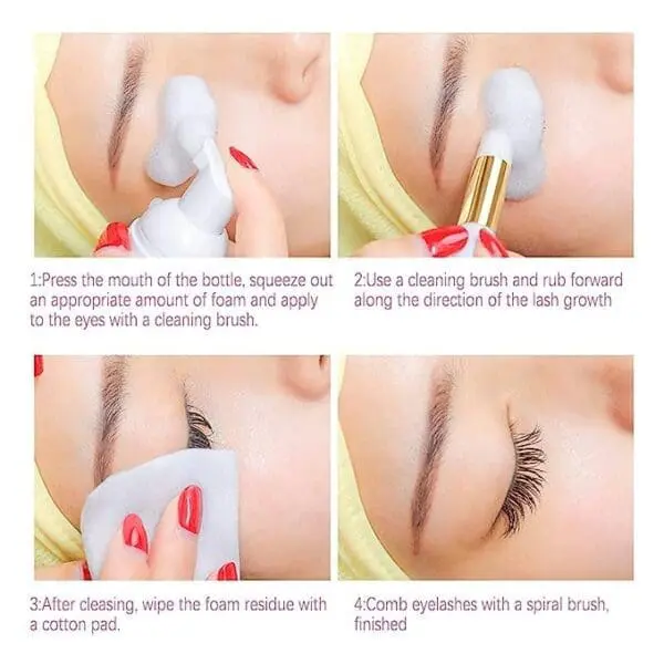 A woman is cleaning her eyelashes with a brush.