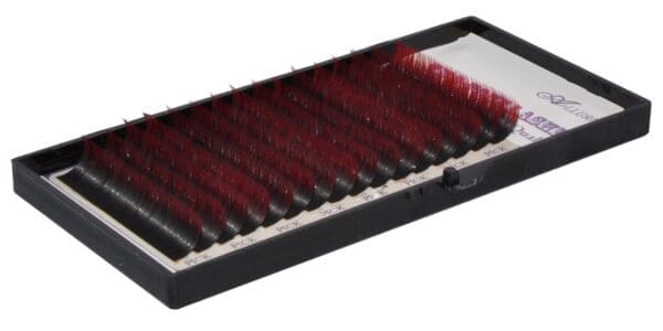 A red and black tray with some red brushes