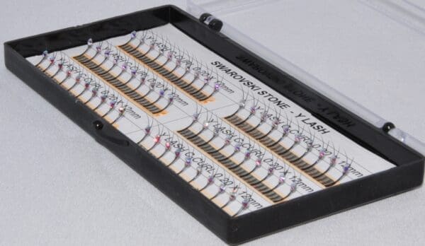 A tray of different types of eyelashes.