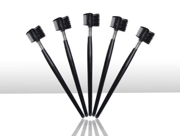 A group of black toothbrushes on top of each other.