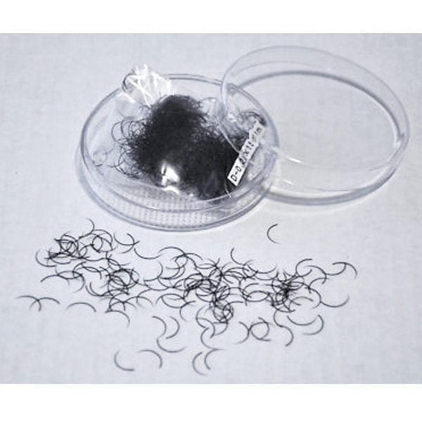 A container of black hair clips and some small pieces.