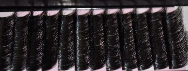 A close up of some black hair on top of each other