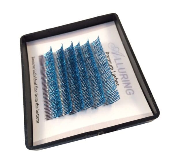 A tray of blue colored individual lashes