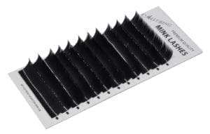 A close up of a strip of black lashes