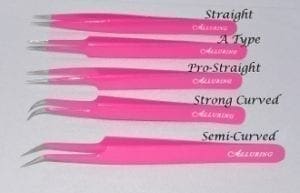 A set of six pink plastic handles with different sizes.