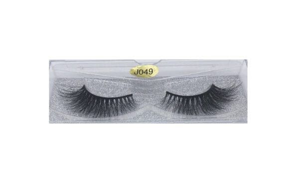 A pair of false eyelashes in a box.