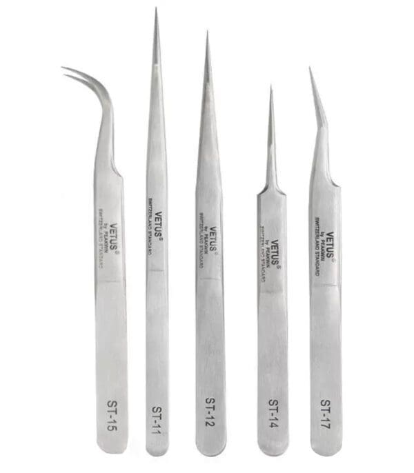 A set of five metal tools with different designs.