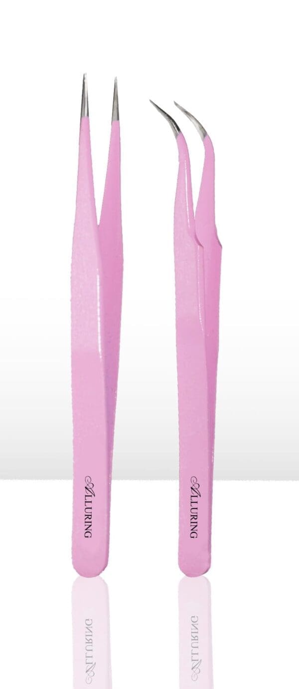 A pair of pink tweezers are standing up.