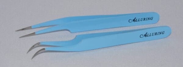 A pair of blue plastic handles on top of a table.