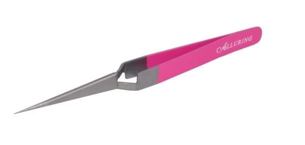 A pink and gray scissors is laying on the floor