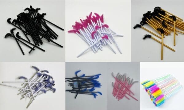 A bunch of different colored toothbrushes on top of each other